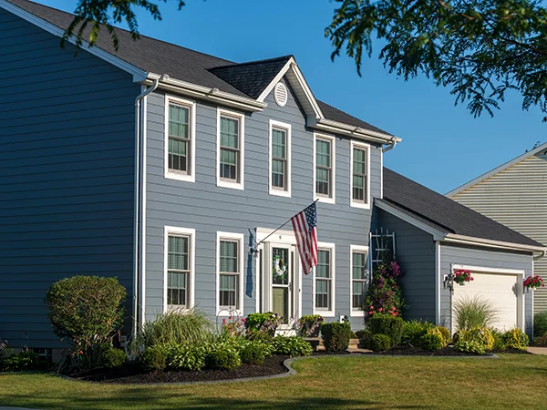 Home with blue siding and white trim