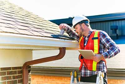 contractor doing maintenance on roof